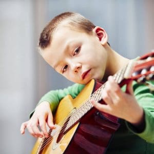 A Guide To Boost Your Child’s Academic Performance with Music Lessons!