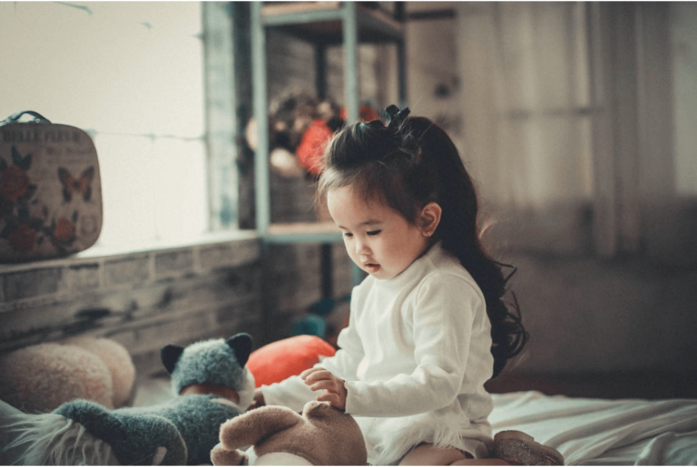 girl playing with toys