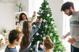 Family-decorating-Christmas-tree