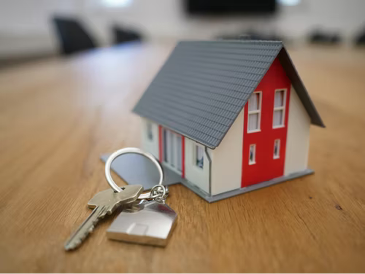 A beautiful house model with keys.