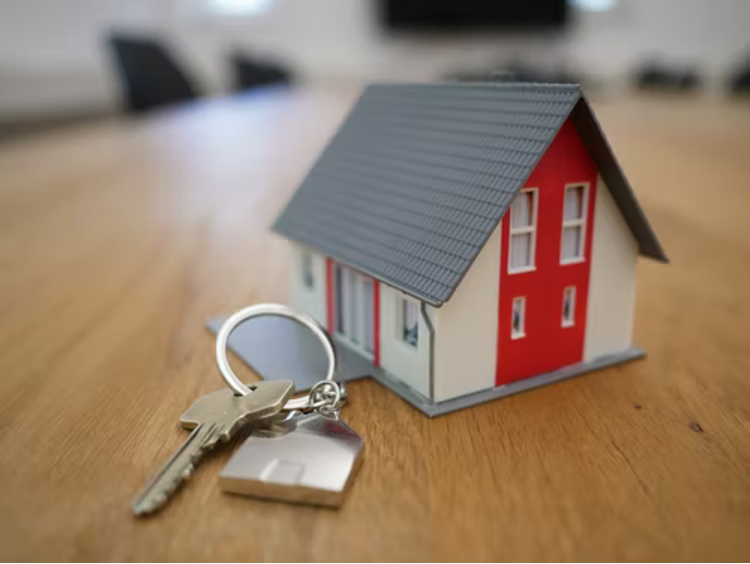 Picture 1 1 A beautiful house model with keys.
