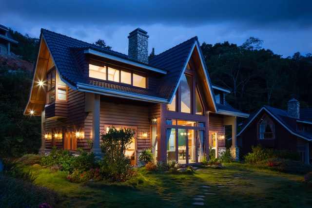 A beautiful house with slope roof and garden.