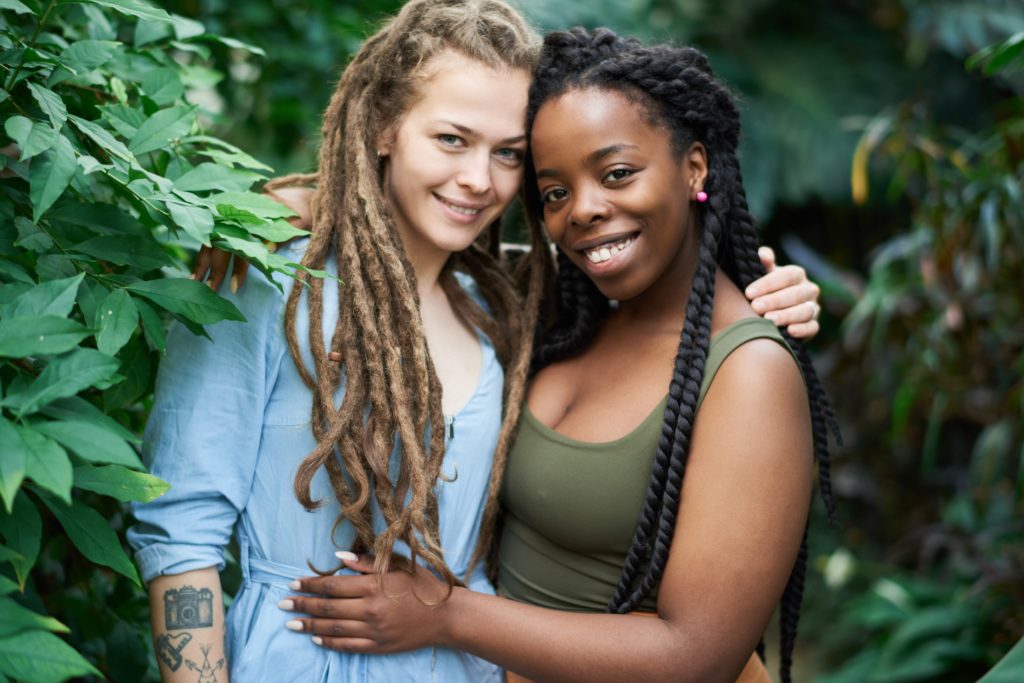 Two girls with different and unique hairstyle.