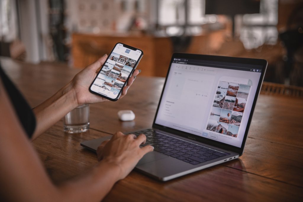 Woman choosing guest posting sites on her laptop.