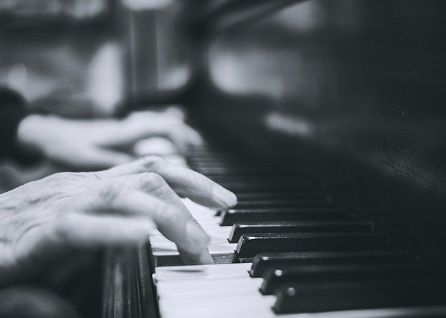 A man playing a piano.