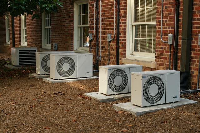 Air conditioner systems are placed outside the house.