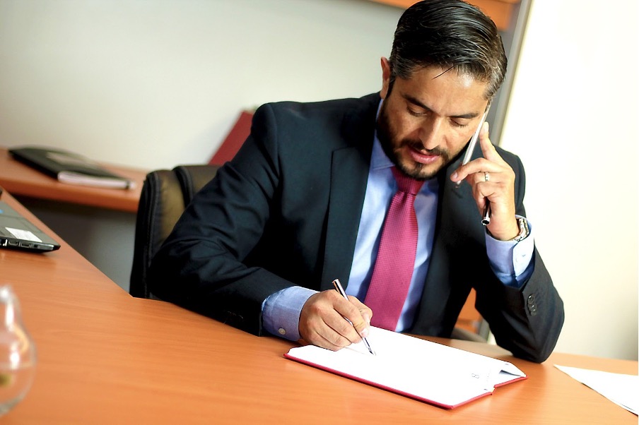 A man talking over the phone.