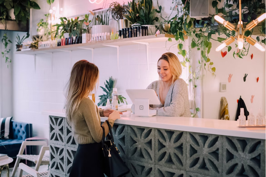 A woman talking to her customer.