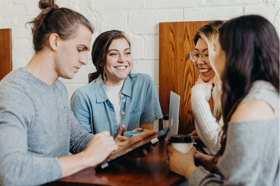 A group of people having a conversation.