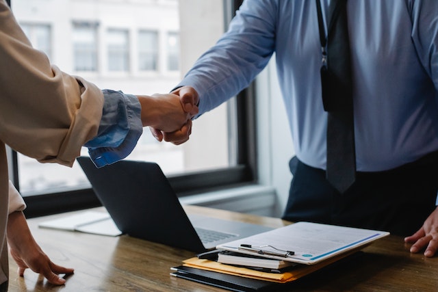 Two Business Partners shaking hands.