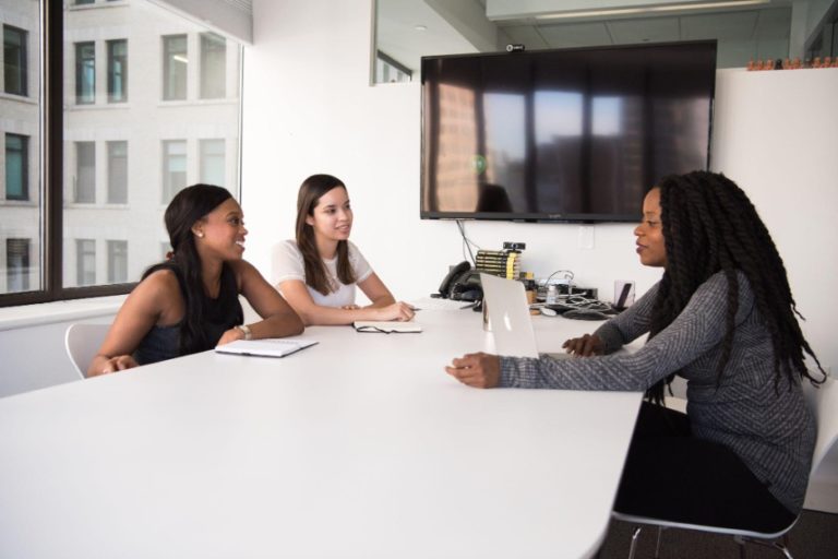 three women talking about Career paths.